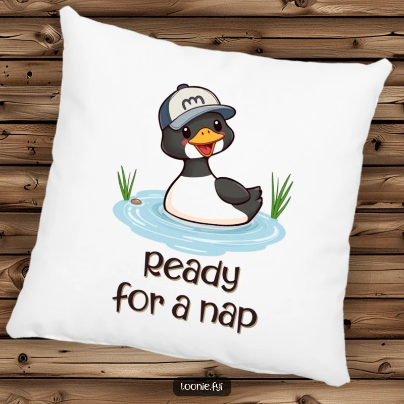 Funny plush pillow featuring a playful loon in a baseball cap, diving into a small lake, providing a soft and humorous decorative touch.