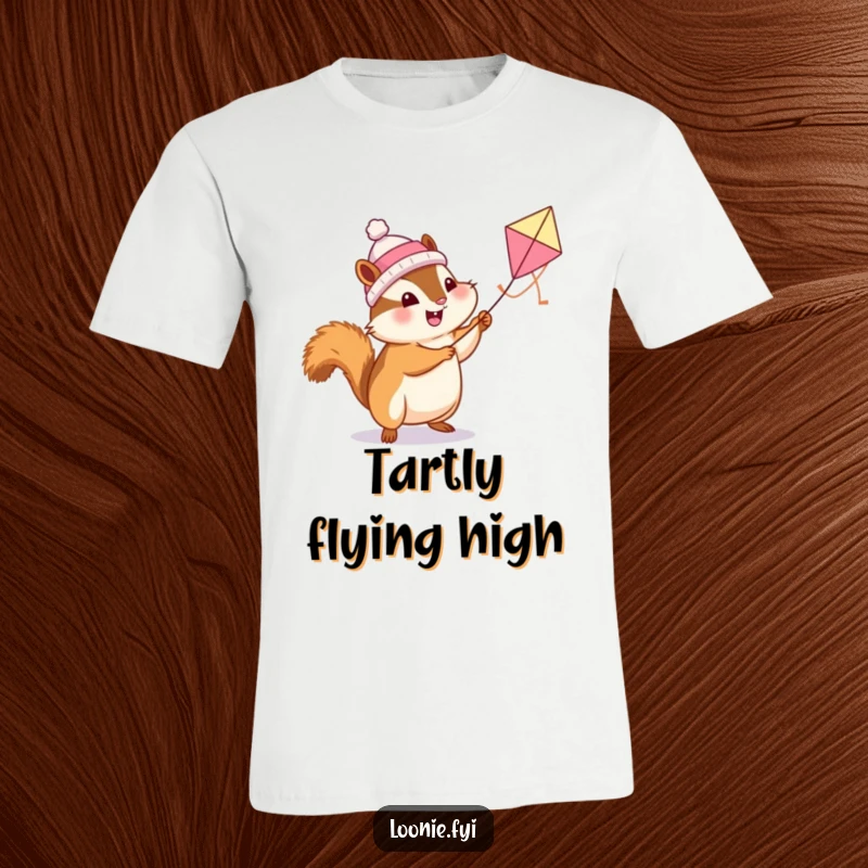 Funny Chipmunk T-Shirt: A happy chipmunk wearing a toque flies a kite shaped like a butter tart, full of joy.