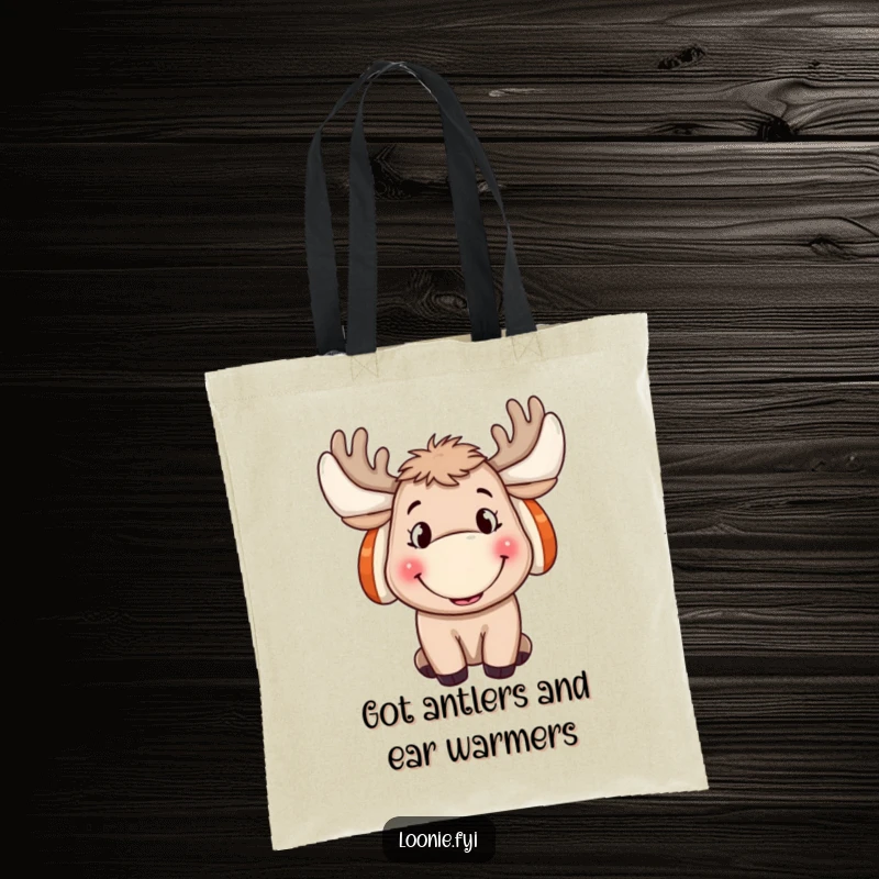 Funny Moose Tote Bag: A cheerful moose with ear muffs and a wide grin, ideal for a humorous carry-all gift.
