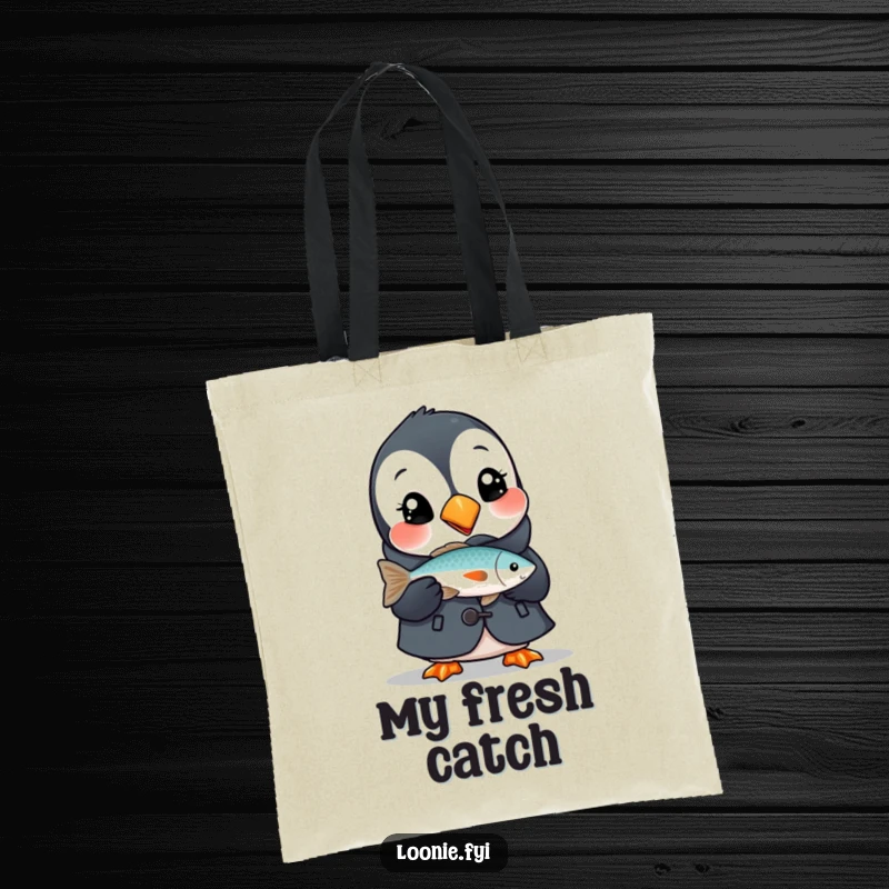 Funny tote bag featuring a delighted puffin in a small coat, holding a fish, perfect for carrying essentials with avian flair.